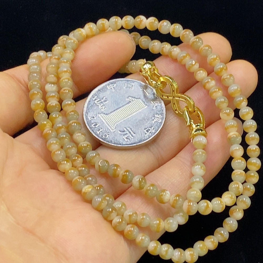 F34024094 Jadeite bead necklace, approximately 3.6mm in size, total weight about 18.79g, non-gold, yellow part color origin undetermined