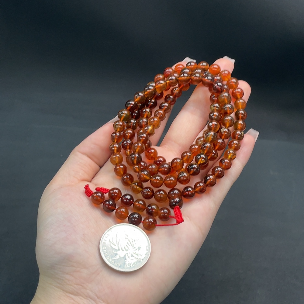 C16760810 Amber Beeswax Bead Strand Approx. 24.36g 7.3mm
