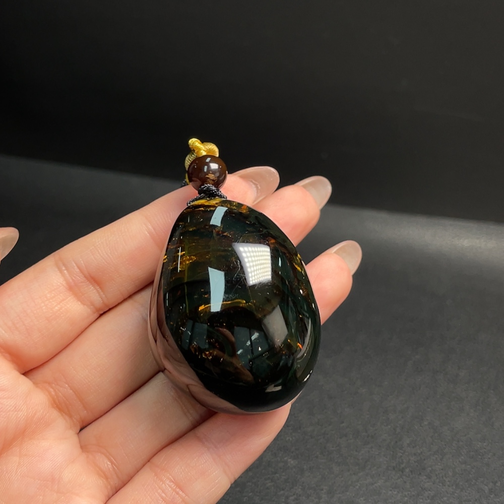 C31619792 Amber and Beeswax Pendant, Total Weight Approx. 27.15g Including Rope