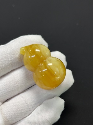 C46536039 琥珀蜜蜡饰品 局部可见修补 货品总重约12.52g