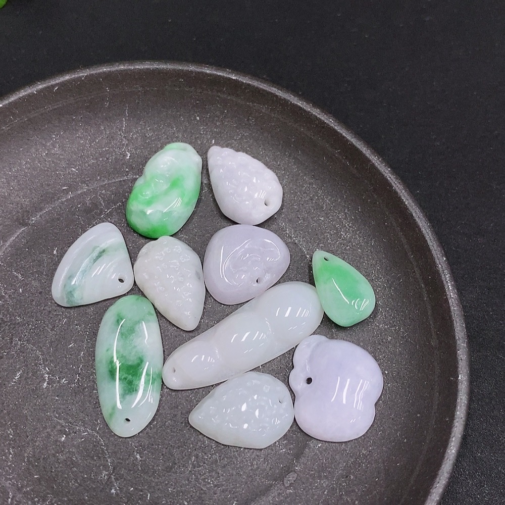 F33877446 Jadeite Pendants Sell as a Lot