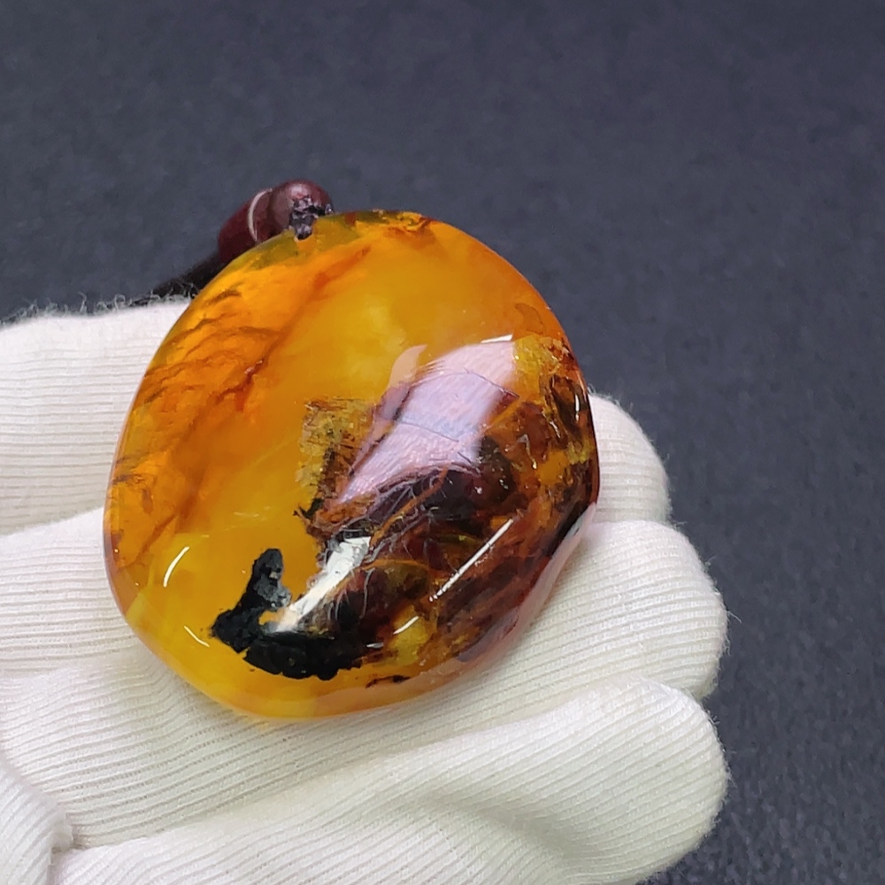 C30474274 Amber Beeswax Pendant with Partial Visible Repairs, Total Weight Approx. 16.91g Including Cord