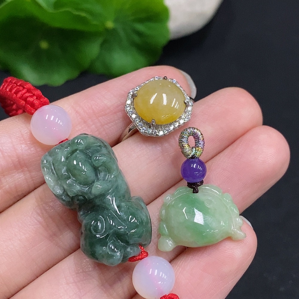 F33941314 Jadeite Pendant + Cabochon Ring + Bracelet Sell as a Lot Non-Gold Setting Adjustable Size Yellow Color Origin Undetermined Non-Jadeite Beads