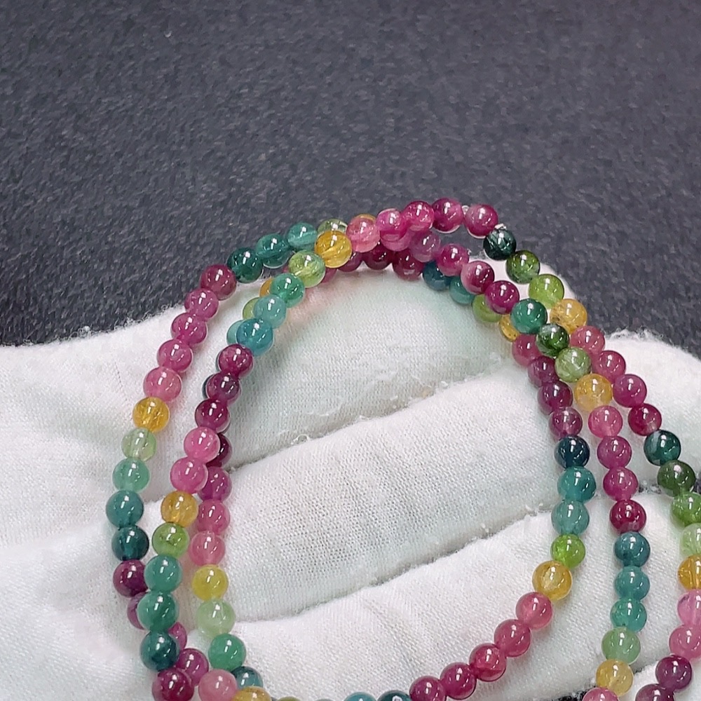 C33922632 Tourmaline bead strand with visible organic matter, total weight approx. 15.48g, bead size approx. 4mm