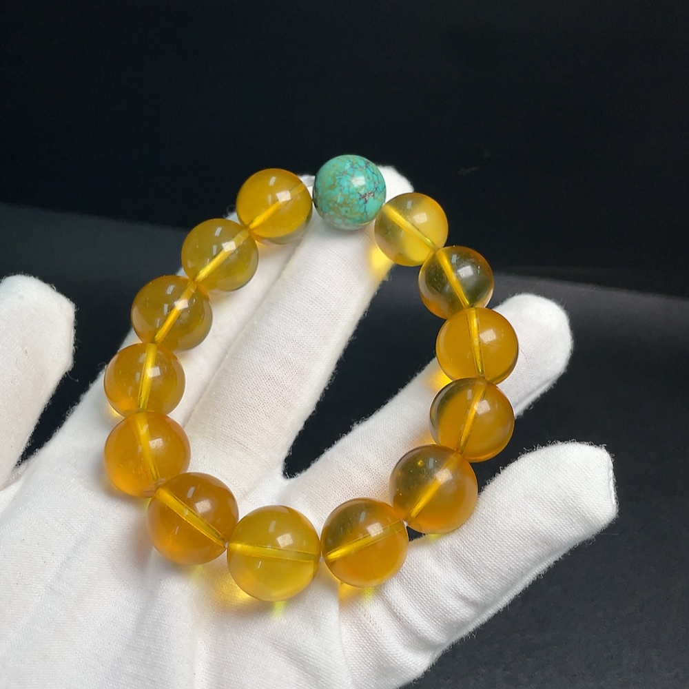 C33921132 Amber Beeswax Bracelet with Turquoise (color origin undetermined) containing other mineral components, total weight approx. 31.69g, size approx. 14.7mm