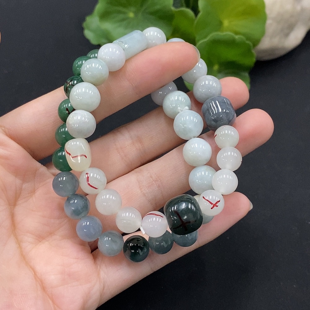 F35115044 Jadeite bracelet with non-A grade beads and impurity stones