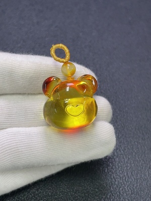 C30474515 Amber beeswax pendant coated, total weight approx. 6.38g