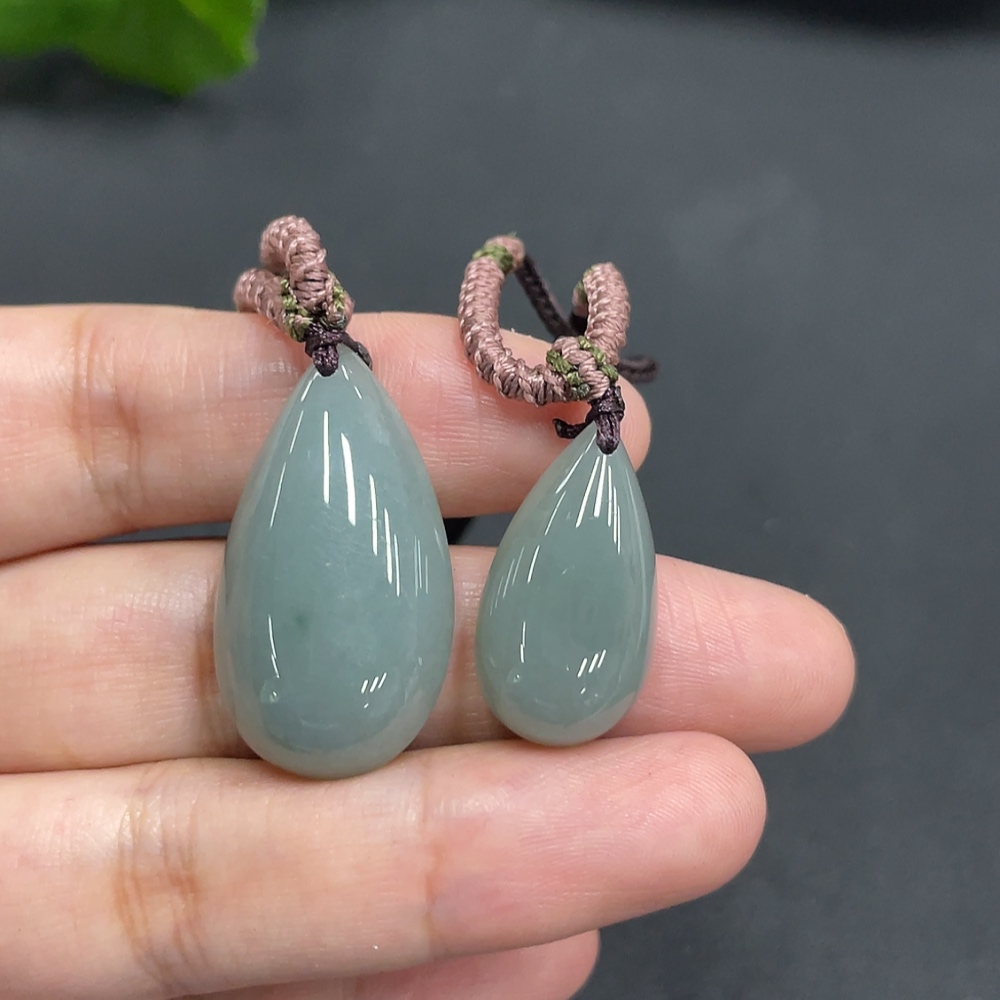 F08347818 Jadeite Pendants Sell as a Lot