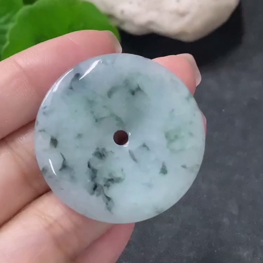 F34041946 Jadeite Pendant Peace Knot with an approximate total weight of 12.36g and containing other mineral components