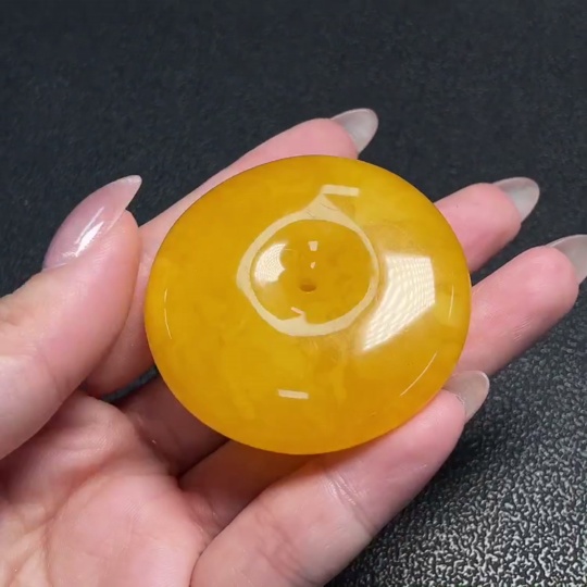 C34009607 Amber Beeswax Pendant with a total weight of approximately 17.71 grams