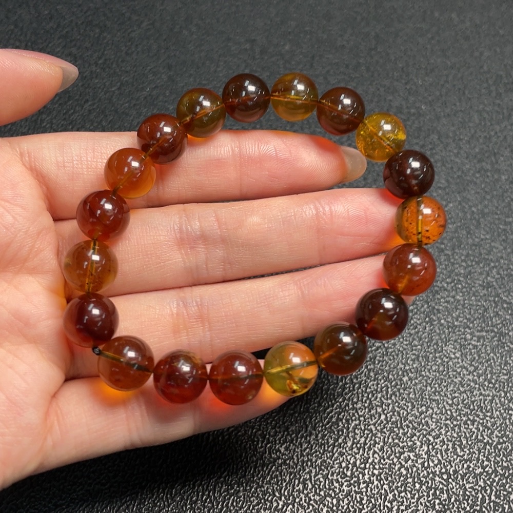 C29403695 Amber Beeswax Bracelet, approx. 9.9mm, total weight approx. 10.53g