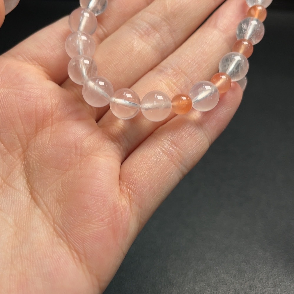 C30469368 Crystal Bracelet with approximately 8mm beads, total weight about 14.99g, paired with Southern Red Agate (visible organic matter)