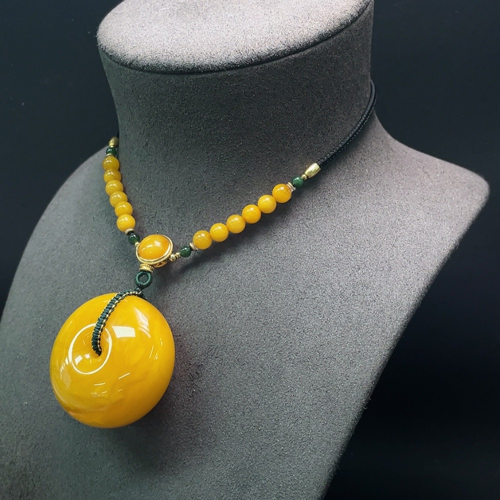 C28312062 Amber Beeswax Pendant with Hetian Jade, Total Weight Including Rope Approximately 34.68g, Non-Gold-Inlaid