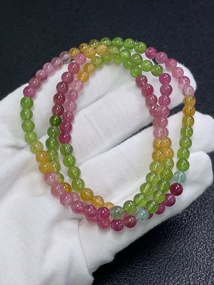 C31619379 Tourmaline bead strand with visible organic inclusions and other mineral components, total weight approx. 21.01g, bead size approx. 4.5mm