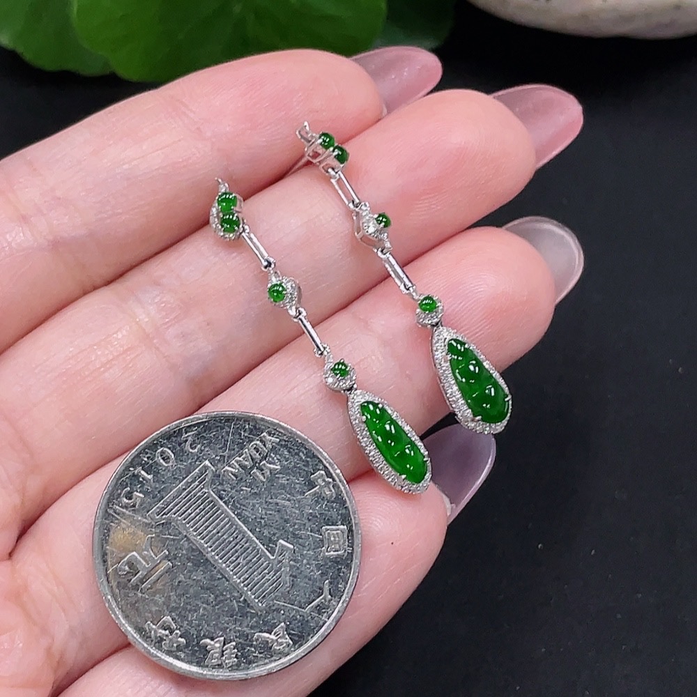 F34982006 Jadeite earrings set in 18K gold with diamonds, total weight approximately 2 grams per pair