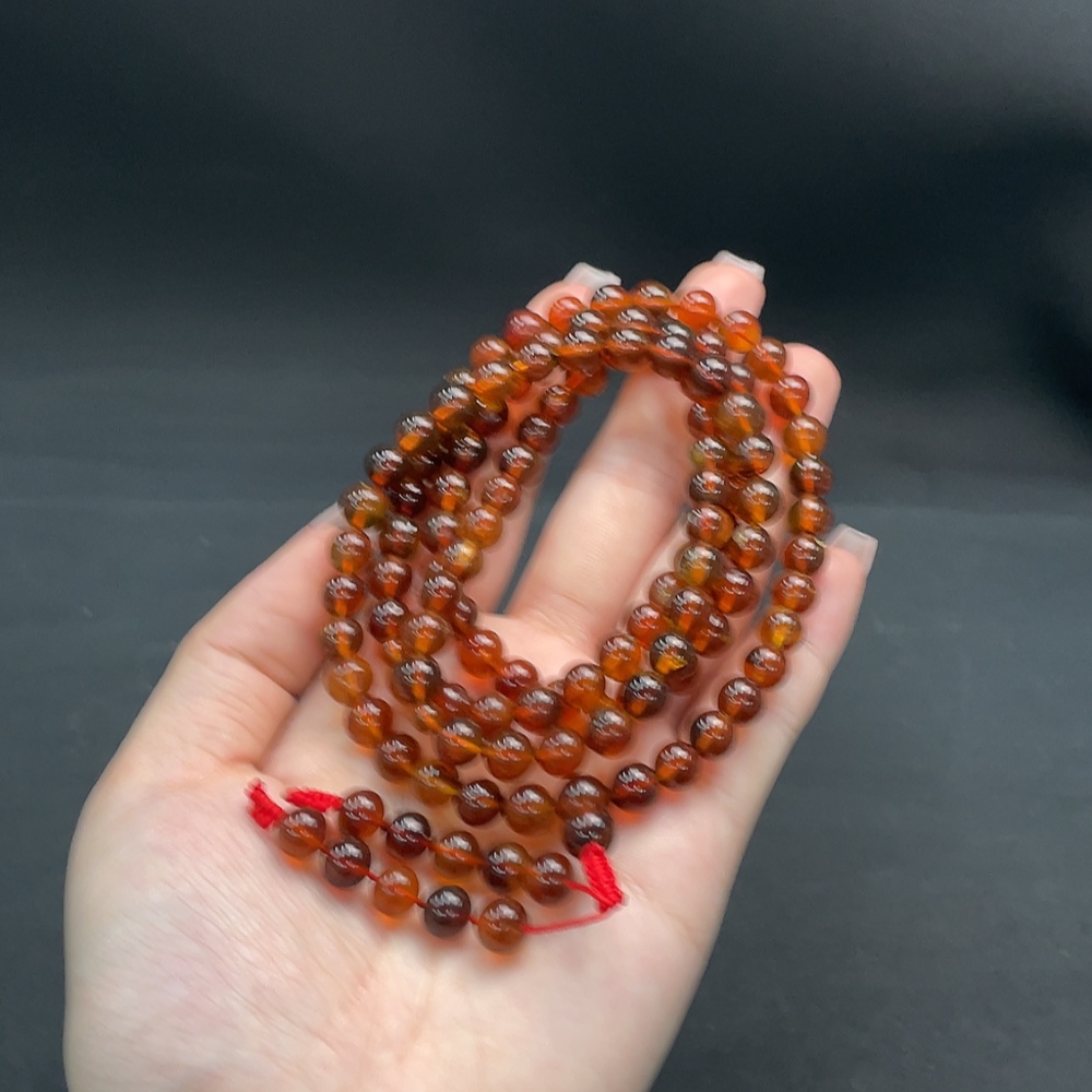 C16760810 Amber Beeswax Bead Strand Approx. 24.36g 7.3mm