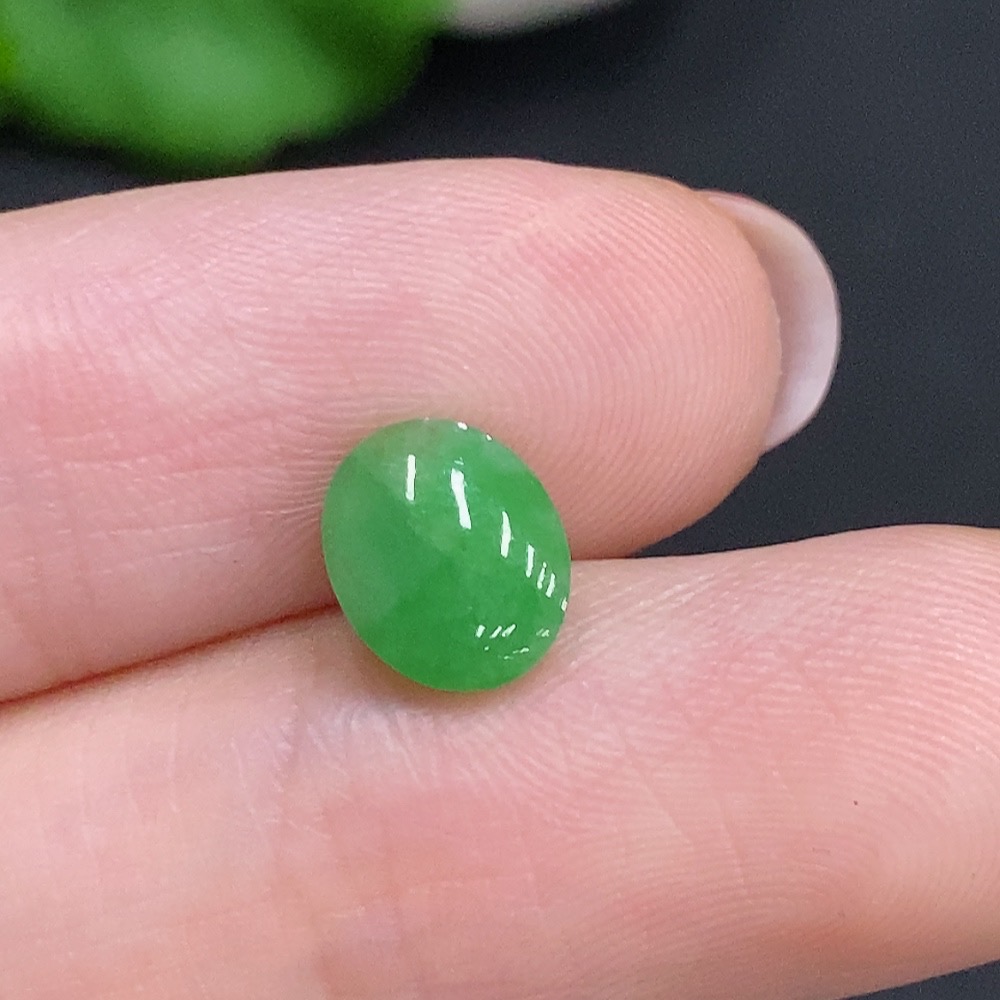 F34969171 Jadeite cabochon, total weight approximately 0.3g
