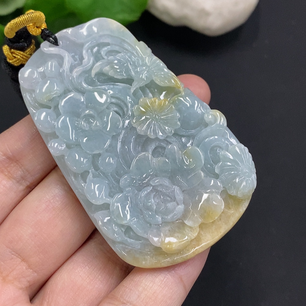 F35163715 Jadeite Flower of Prosperity Pendant with a total weight of approximately 58 grams including the cord