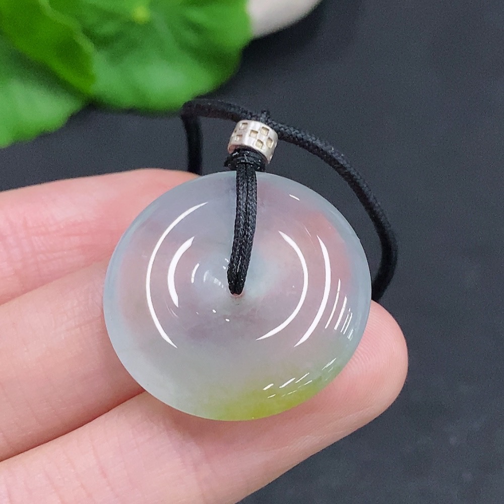 F33908119 Jadeite Peace Knot, total weight including cord approximately 10.3g