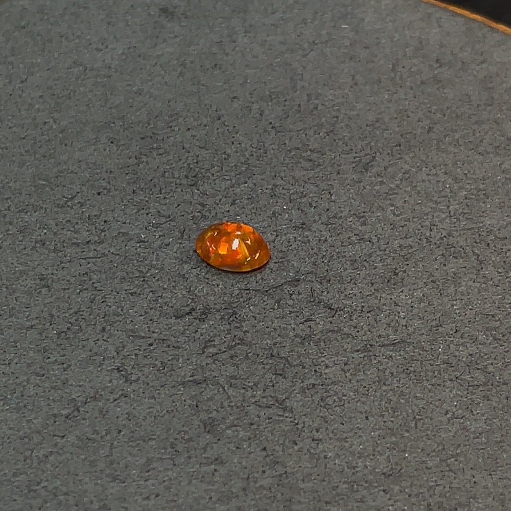 C32785569 Opal loose stone, color origin undetermined, total weight approximately 0.75 carat