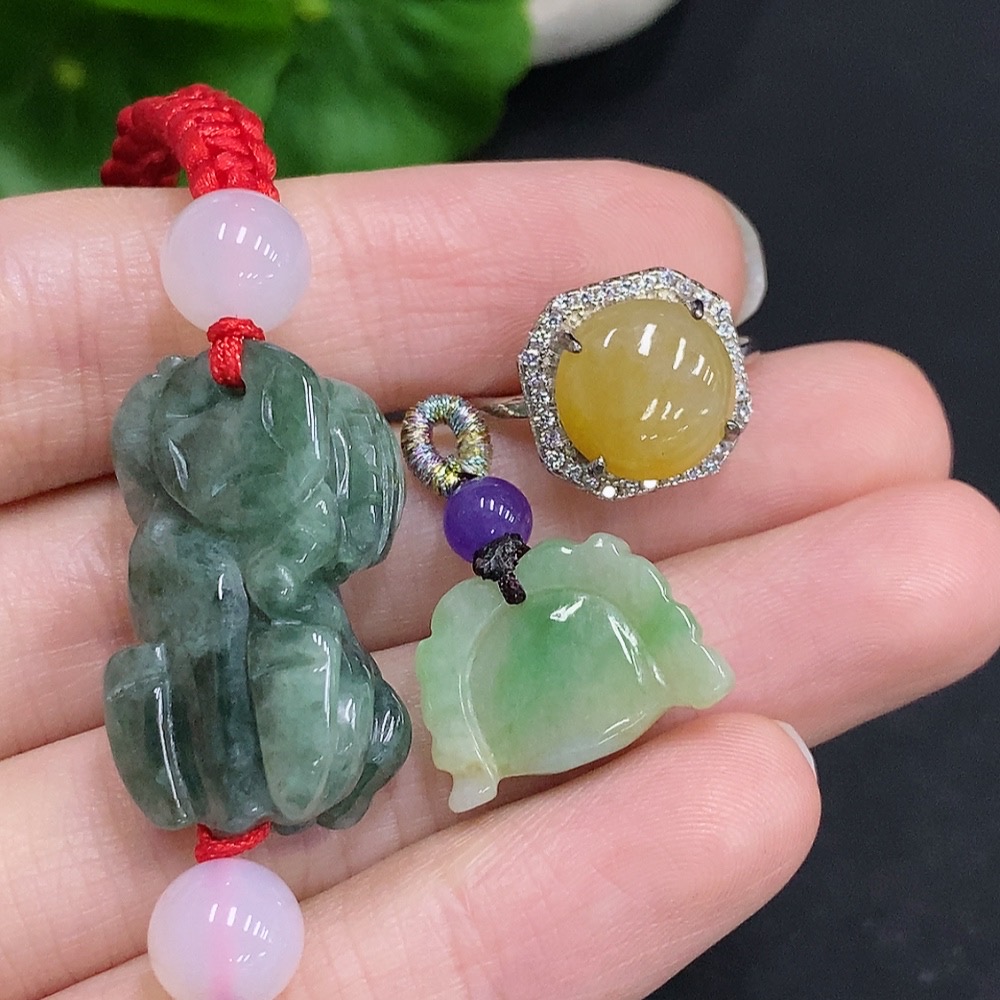 F33941314 Jadeite Pendant + Cabochon Ring + Bracelet Sell as a Lot Non-Gold Setting Adjustable Size Yellow Color Origin Undetermined Non-Jadeite Beads