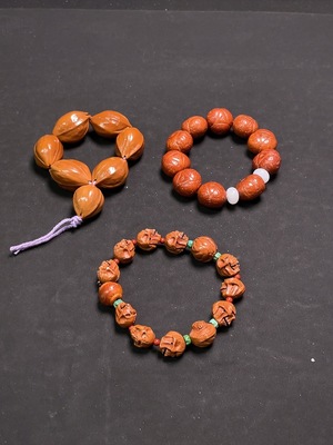 W36237615 Phoenix Eye Bracelet + Olive Pit Bracelet Sell as a Lot