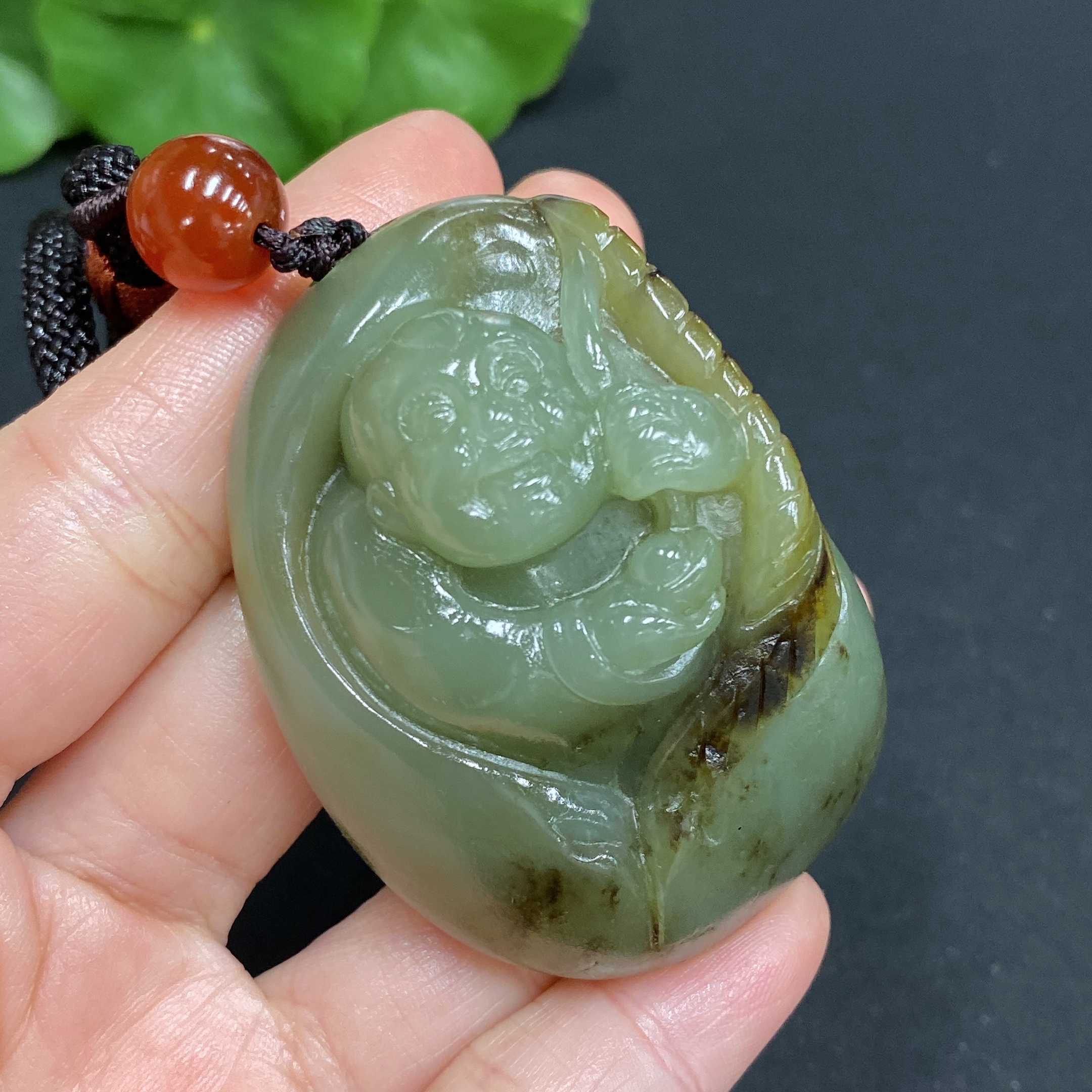 H25872096 Hetian Jade Handheld Ornament - Boy; Total Weight (Including Rope): Approx. 78.7g; Undetermined Skin Color Origin