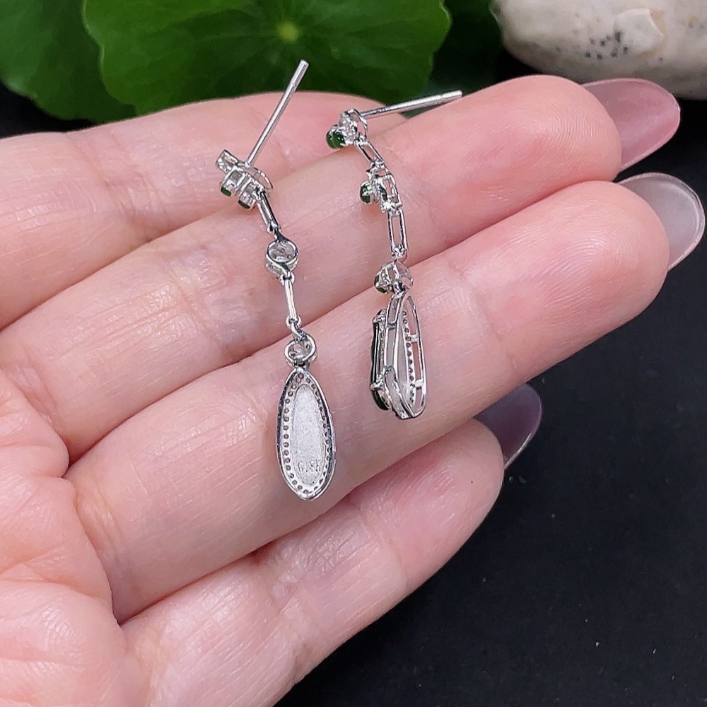 F34982006 Jadeite earrings set in 18K gold with diamonds, total weight approximately 2 grams per pair