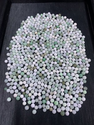 F46549026 翡翠珠子 一手走60+ 颜色成因未定 含其他矿物成分  货品总重约441.45g含袋