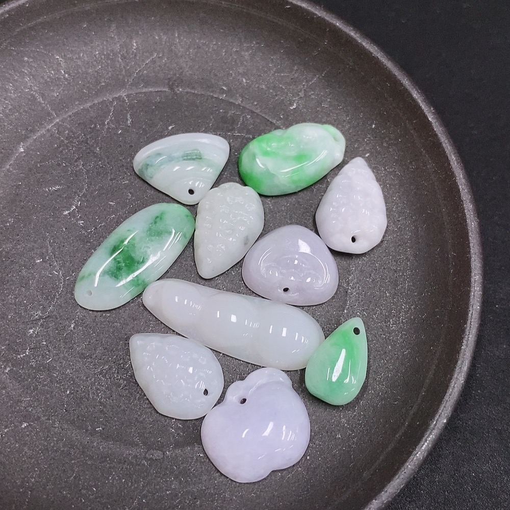 F33877446 Jadeite Pendants Sell as a Lot