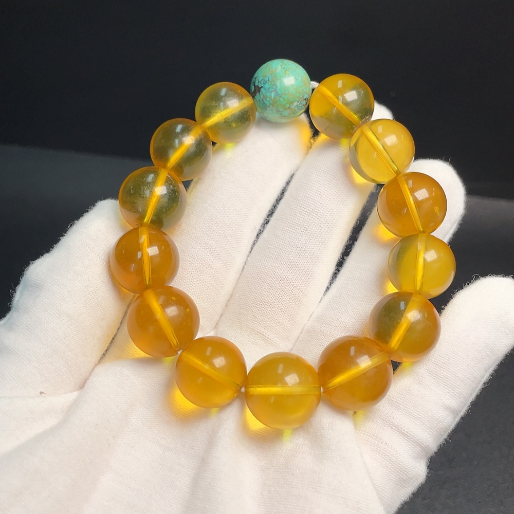 C33921132 Amber Beeswax Bracelet with Turquoise (color origin undetermined) containing other mineral components, total weight approx. 31.69g, size approx. 14.7mm