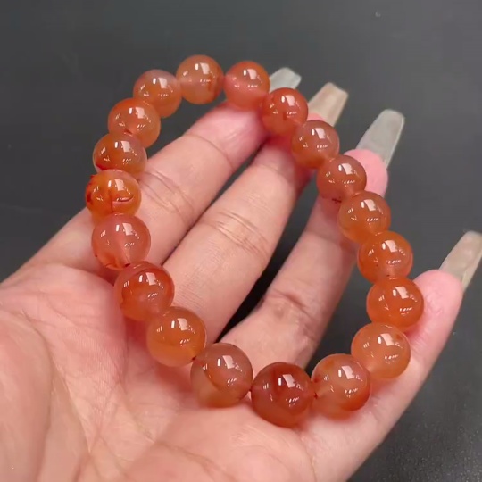 C21311547 South Red Agate Bracelet, approx. 11mm beads, total weight about 36.06g, organic matter visible