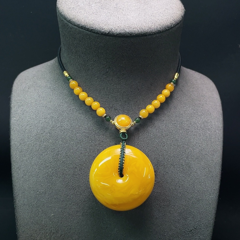 C28312062 Amber Beeswax Pendant with Hetian Jade, Total Weight Including Rope Approximately 34.68g, Non-Gold-Inlaid