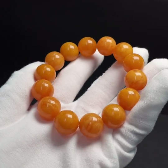 C34009947 Amber Beeswax Bracelet Total weight about 30.13g Size about 15.7mm Color origin undetermined