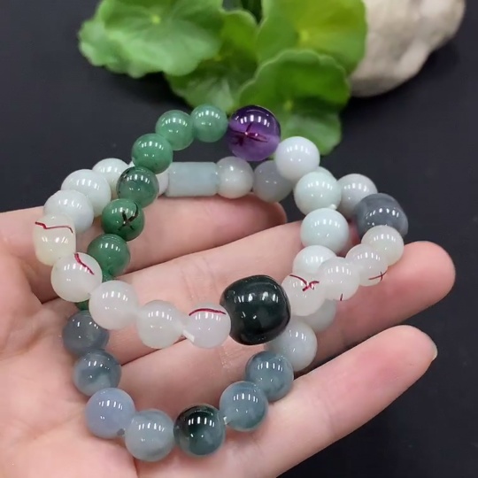 F35115044 Jadeite bracelet with non-A grade beads and impurity stones