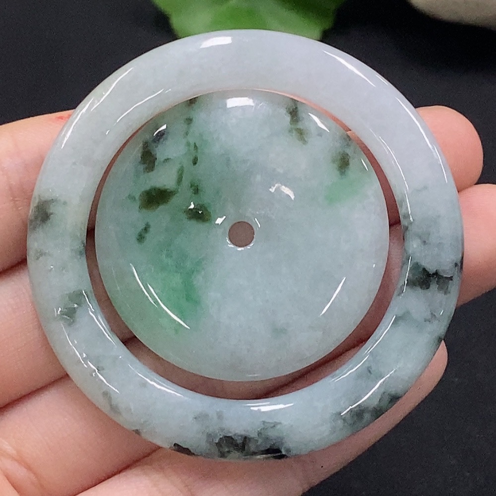 F34028663 Jadeite mother-and-child button set containing other mineral components