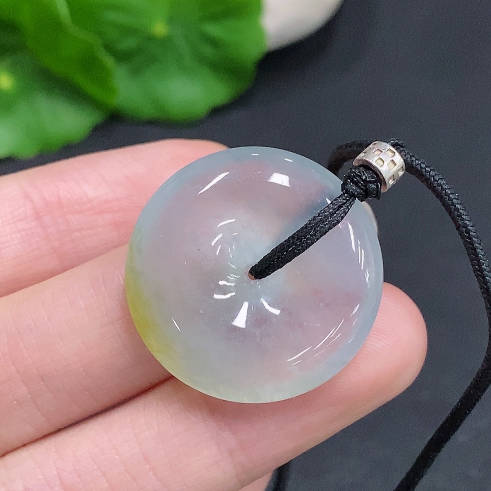 F33908119 Jadeite Peace Knot, total weight including cord approximately 10.3g