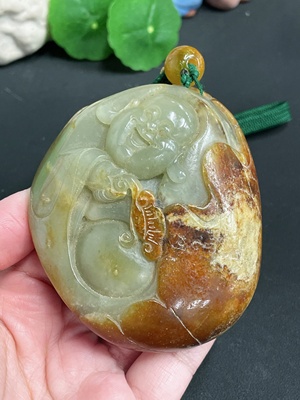 H18963176 Hetian Jade Handheld Piece - Buddha Statue, Total Weight (including rope) approx. 309.1g, Undetermined Skin Color Origin