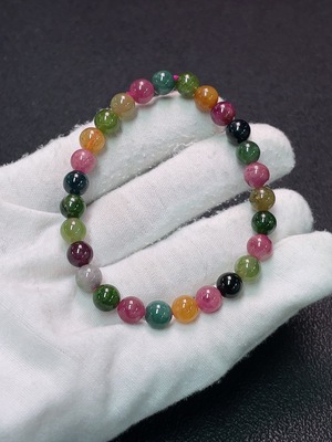 C34039318 Tourmaline bracelet with other mineral components, visible organic matter, total weight approximately 13.28g, size about 6.7mm.