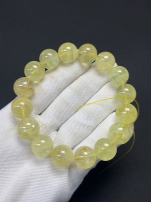 C46476775 水晶手串 颜色成因未定 可见有机物 货品总重约55.68g 卡13.3mm左右