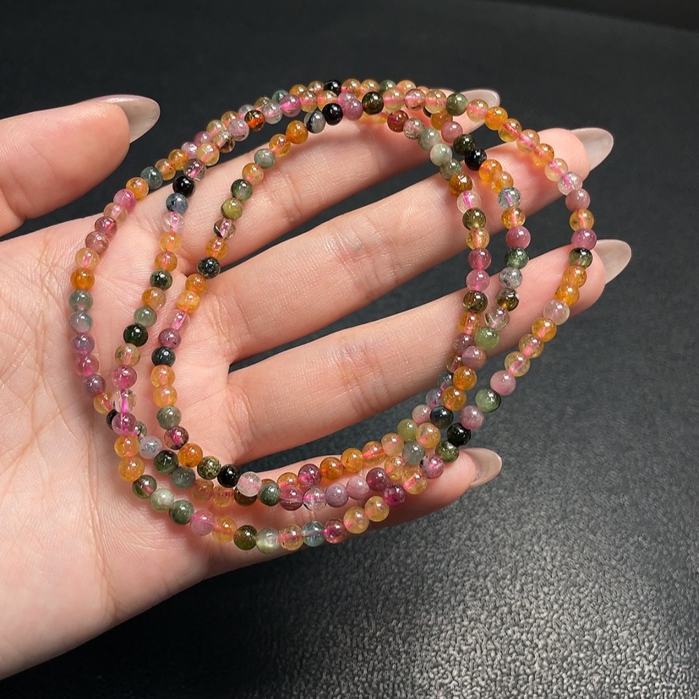 C34008843 Tourmaline bead strand with other mineral components, visible organic matter, total weight approx. 17.98g, size approx. 3.9mm