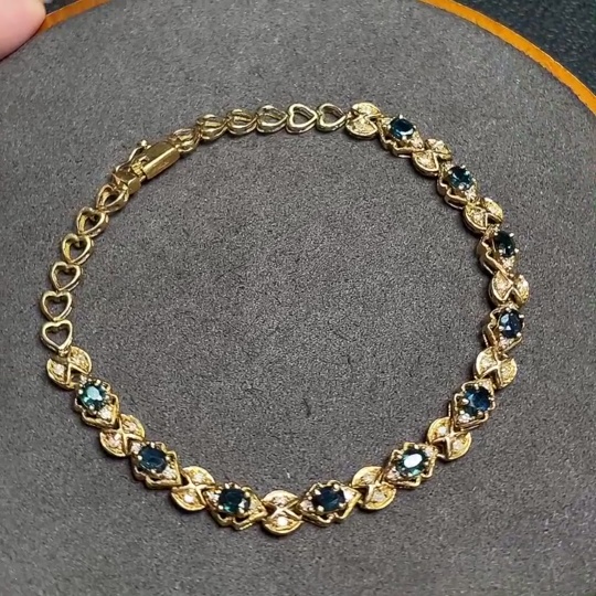 C33922202 Sapphire bracelet, color origin undetermined, accented with diamonds, no imprint, surface gold content approximately 75%, total item weight about 10.19 grams