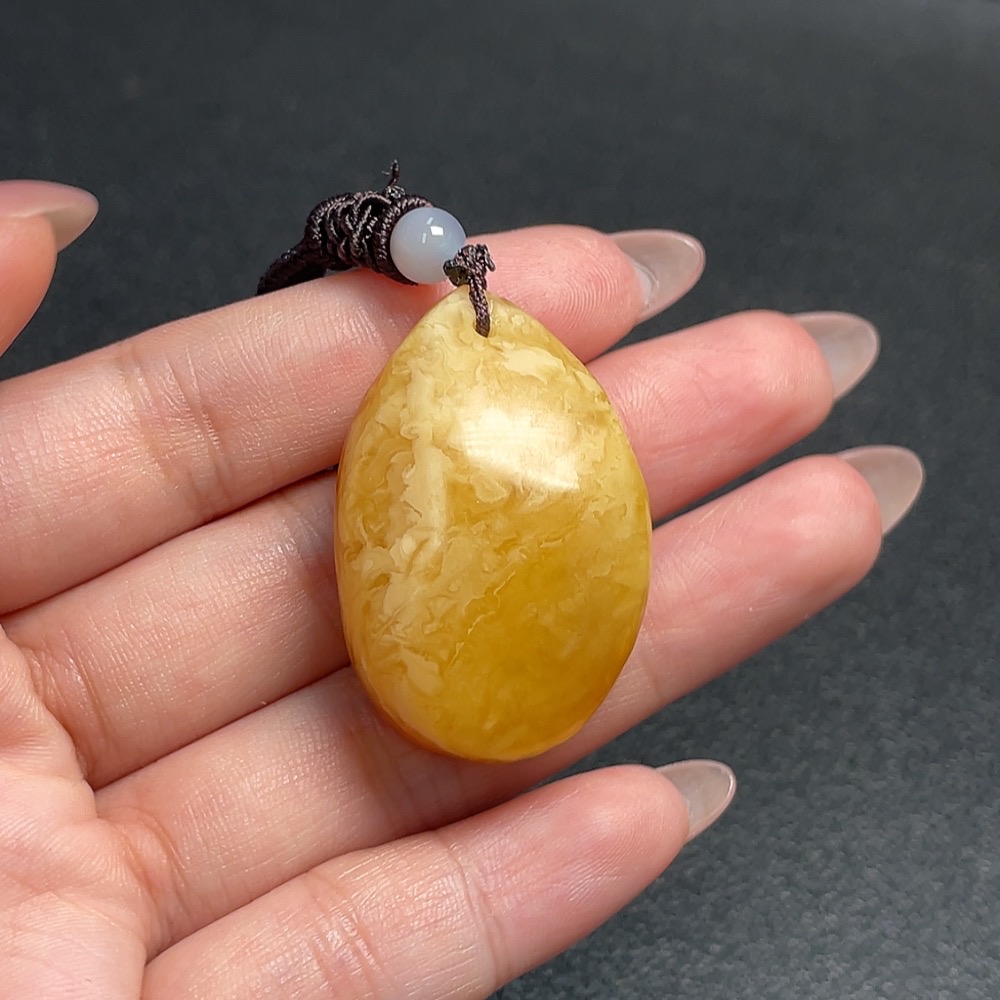 C34992977 Amber Beeswax Pendant Total Weight Approx. 10.97g with Cord