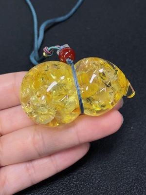 C43160818 琥珀蜜蜡挂件  货品含绳重约33.23克