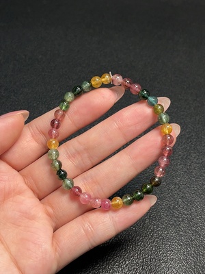 C33870451 Tourmaline bracelet containing other mineral components, visible organic matter, total weight approx. 7.70g, bead size about 5mm
