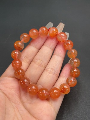 C21311547 South Red Agate Bracelet, approx. 11mm beads, total weight about 36.06g, organic matter visible