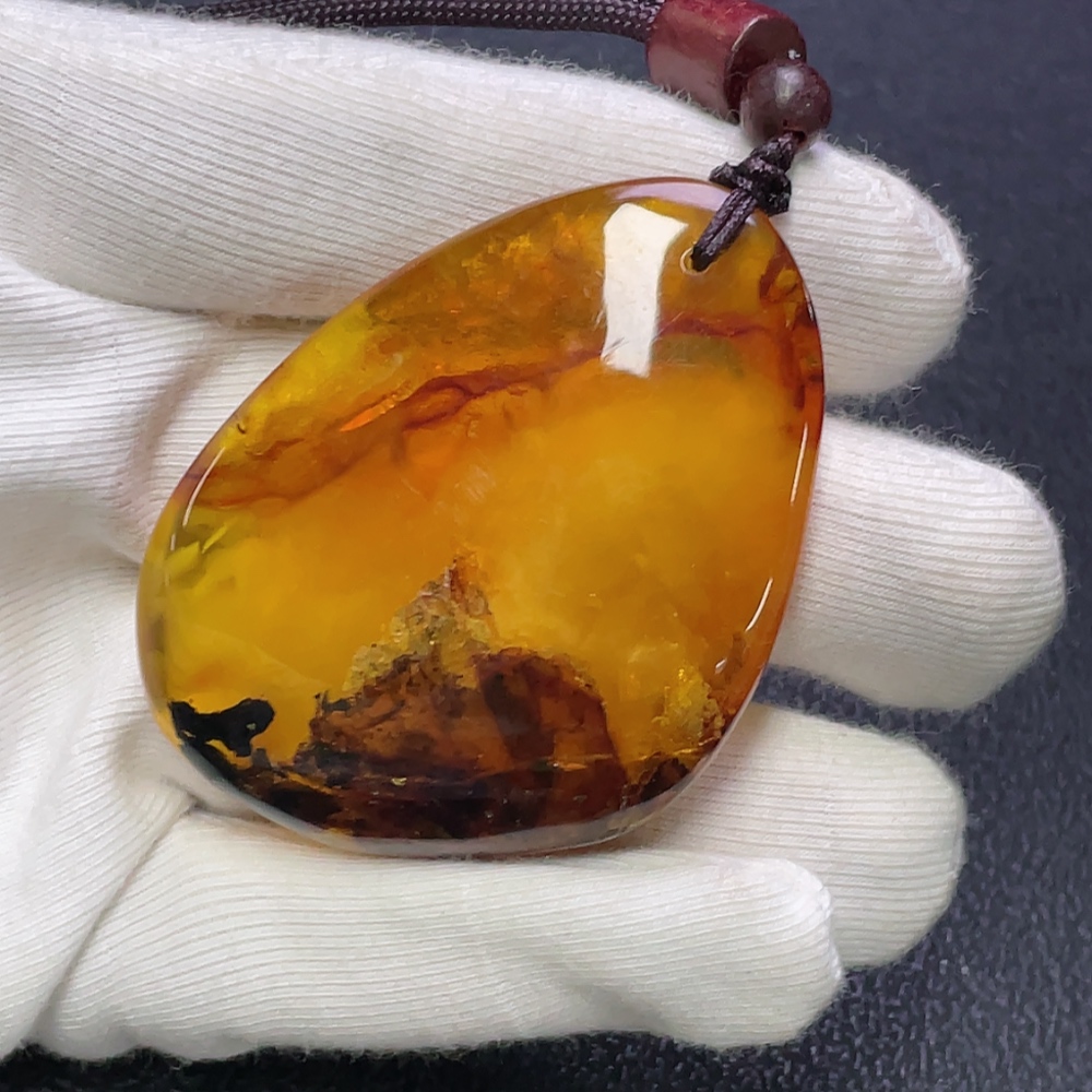 C30474274 Amber Beeswax Pendant with Partial Visible Repairs, Total Weight Approx. 16.91g Including Cord