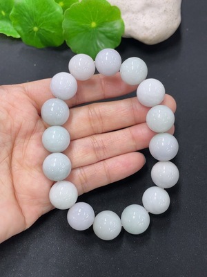 F41934229 翡翠手串 卡13mm左右 货品总约重61.9g 含有色抛光粉