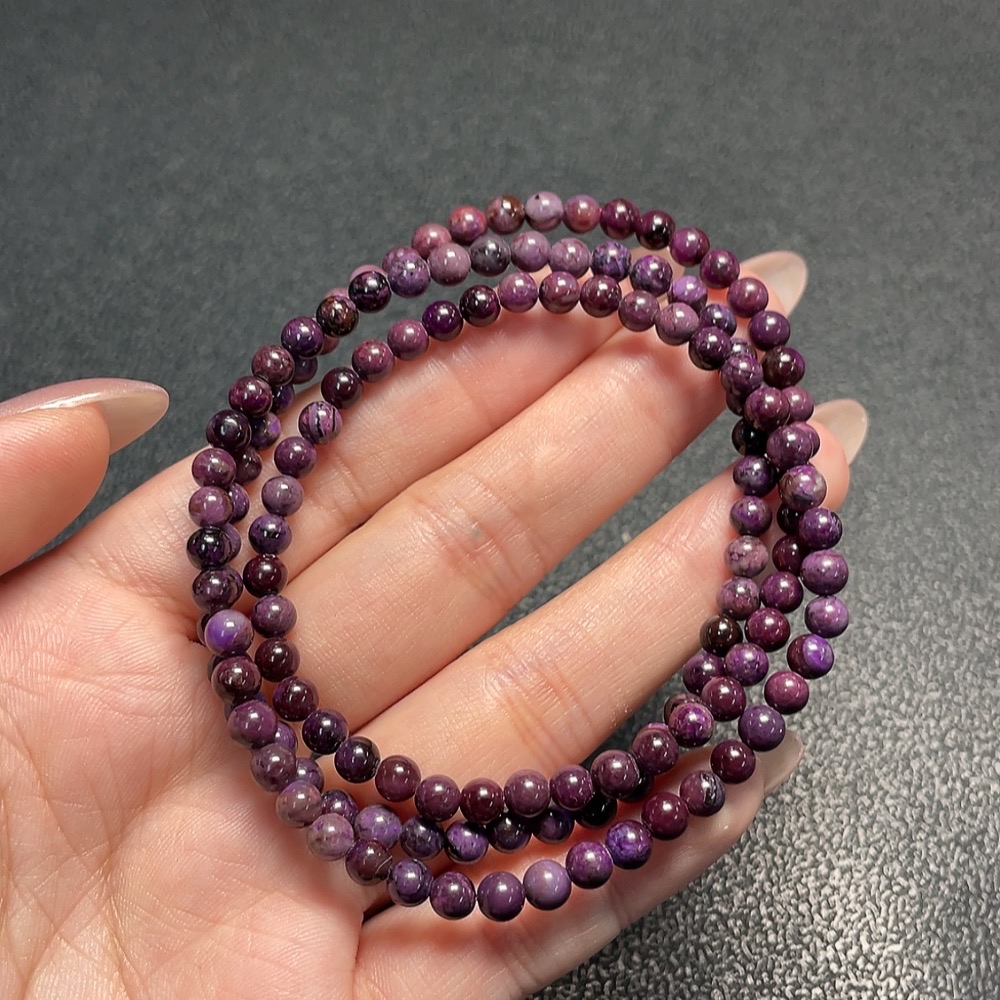 C34009644 Sugilite Bead Strand (with mineral inclusions)