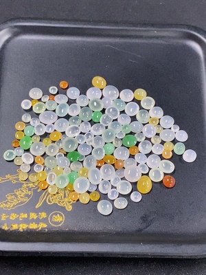 F46519804 翡翠蛋面 一手走 货品总约重 含小袋6.2g 黄颜色成因未定